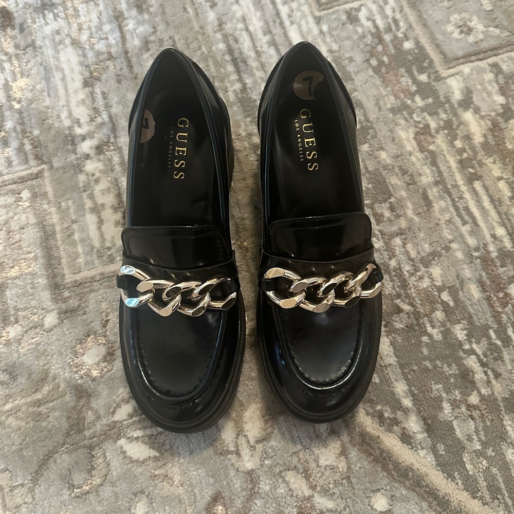 GUESS Shiny Black Loafers with Silver Chain Accent